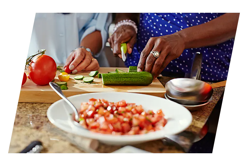 women preparing vegetables for dinner