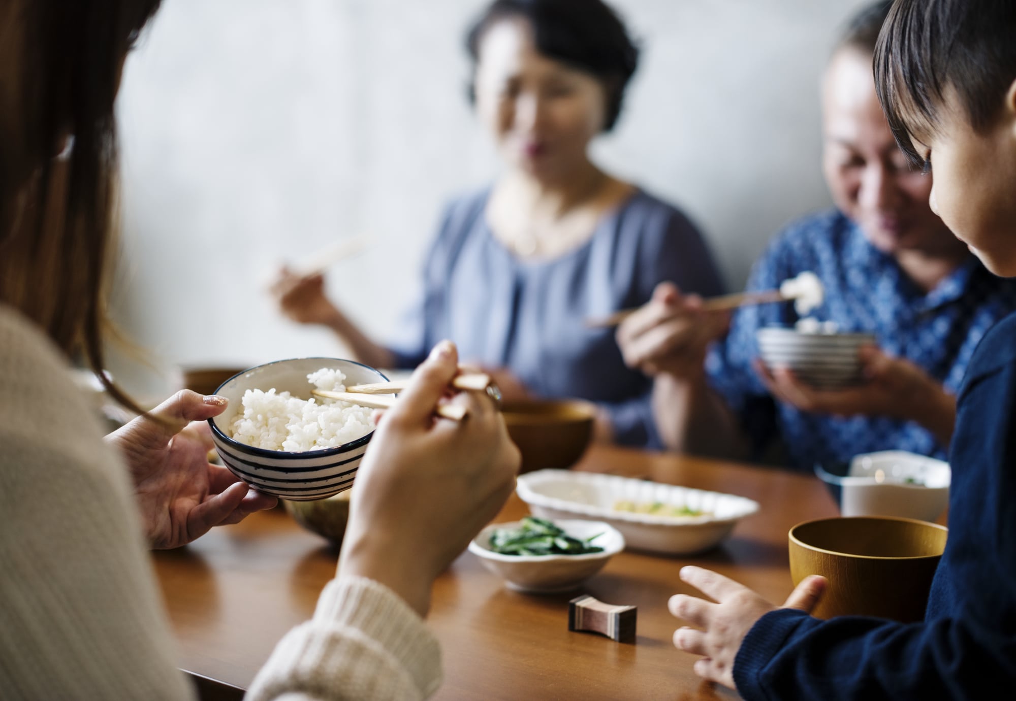 Asian family dining together