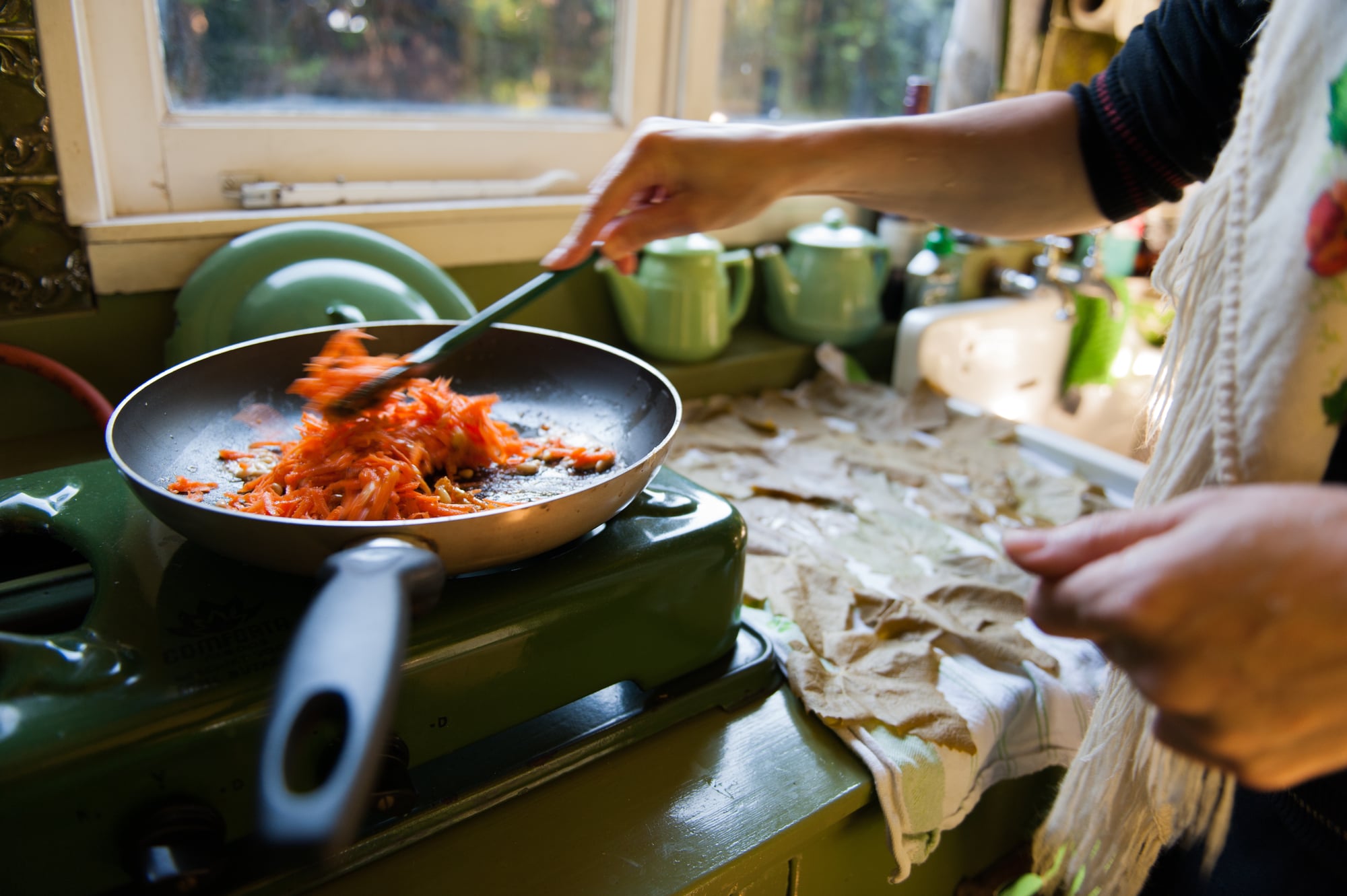 carrots and rice in a pan