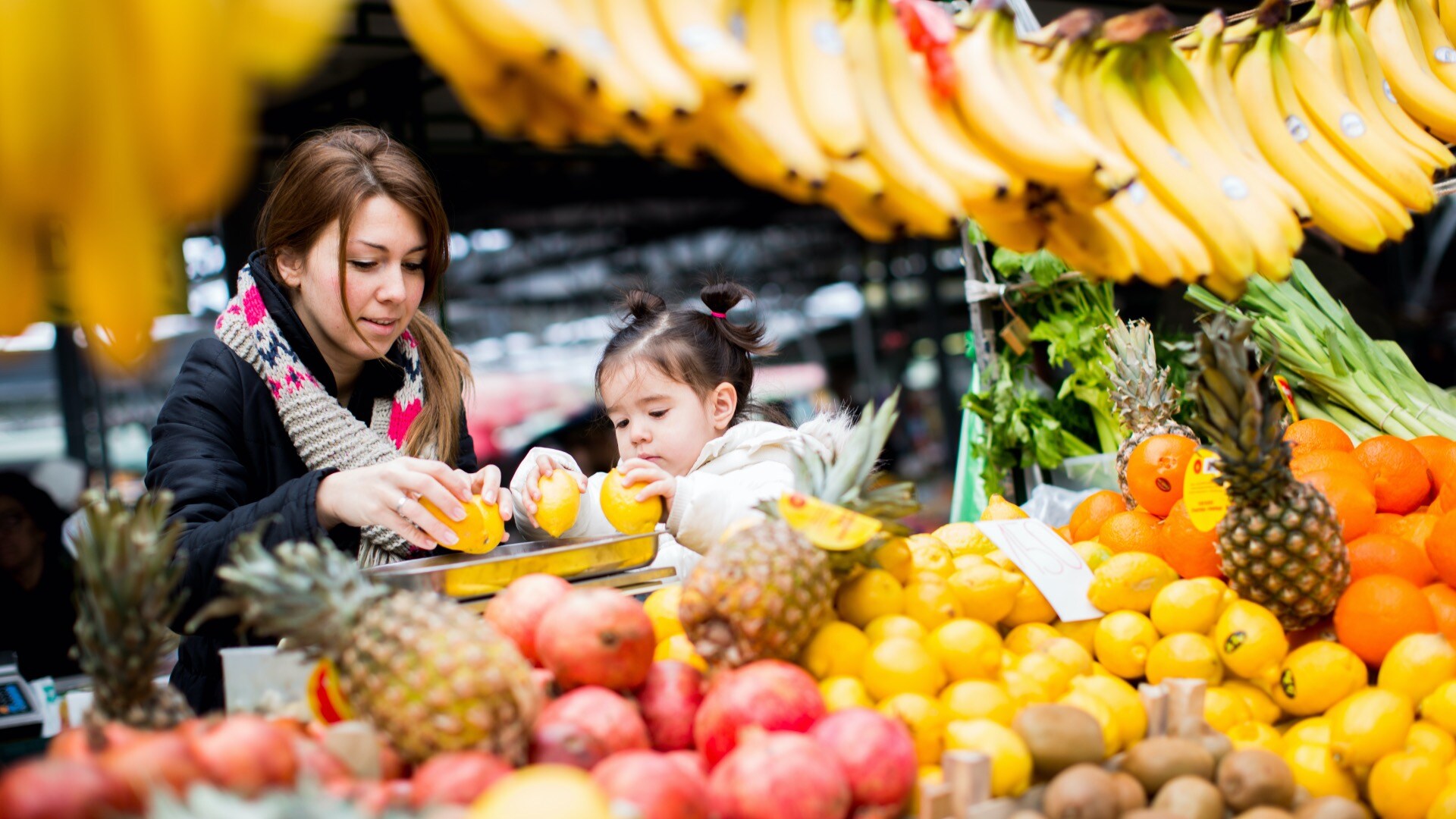 Mother and daughter at a market