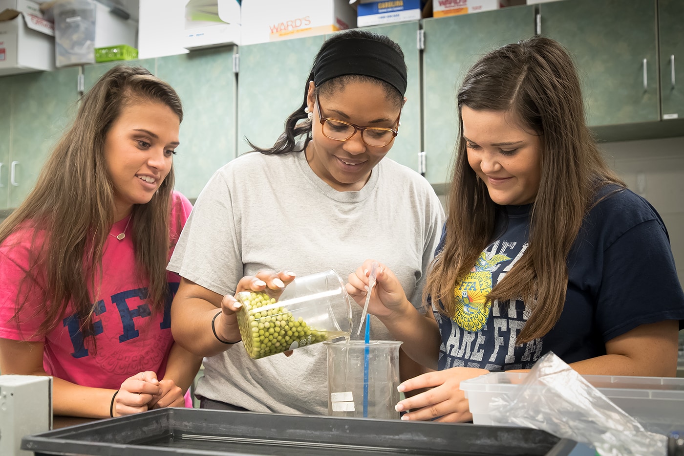 FFA students learn hands-on in a lab.