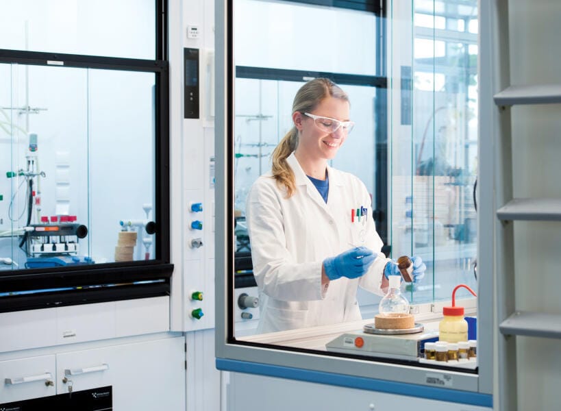 lab assistant weighing material