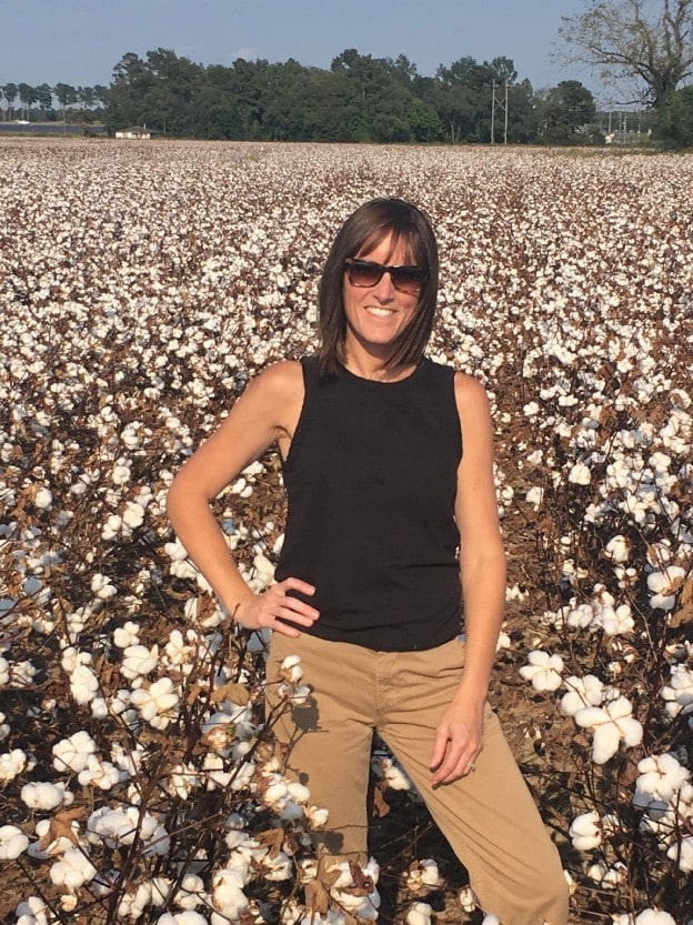 Standing in cotton field