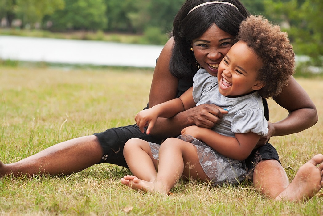 Mother and child playing outside