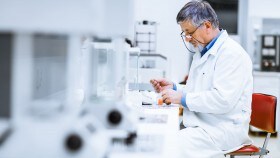  Researcher_weighing_substance